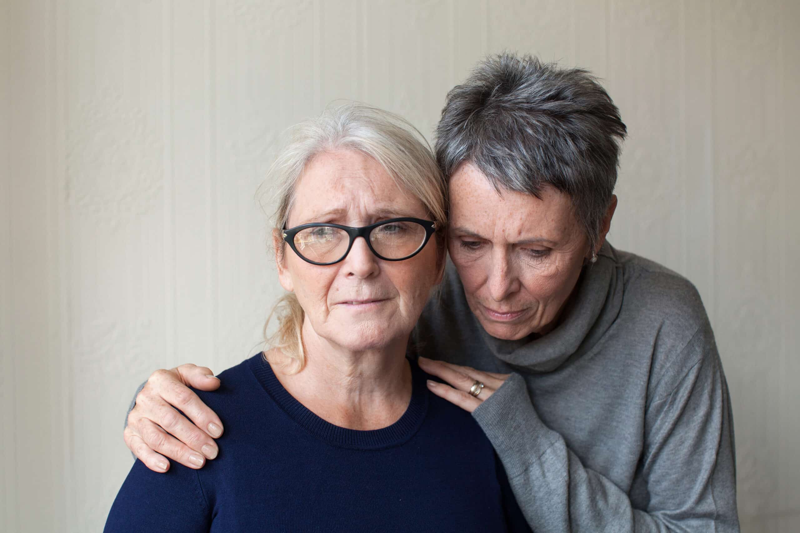 A woman comforting her friend