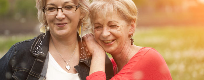 Two women smiling