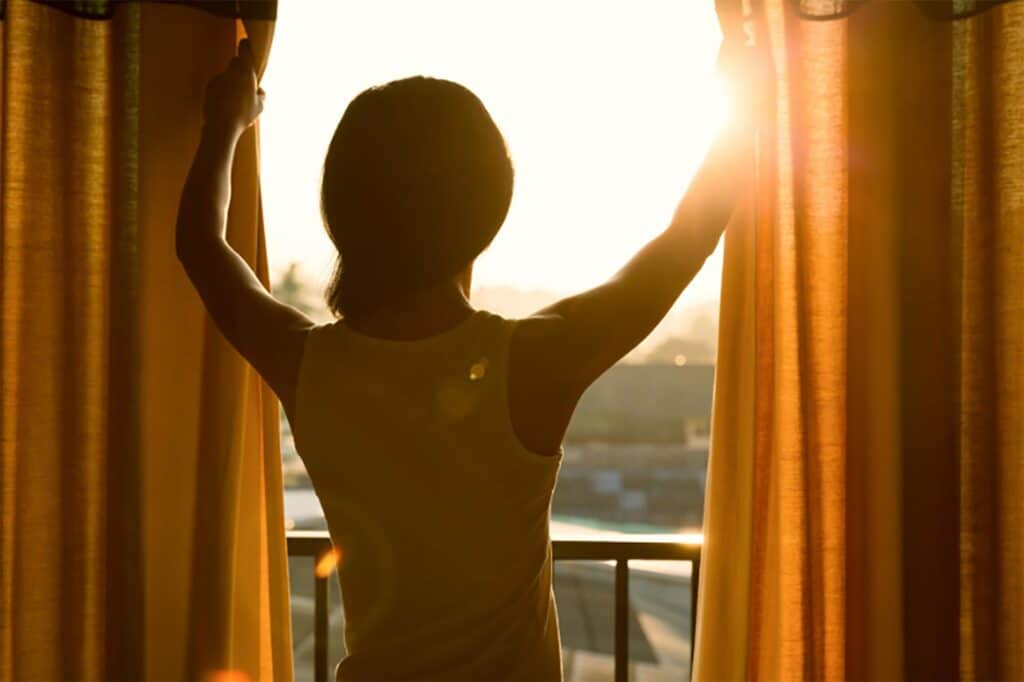 Woman by window