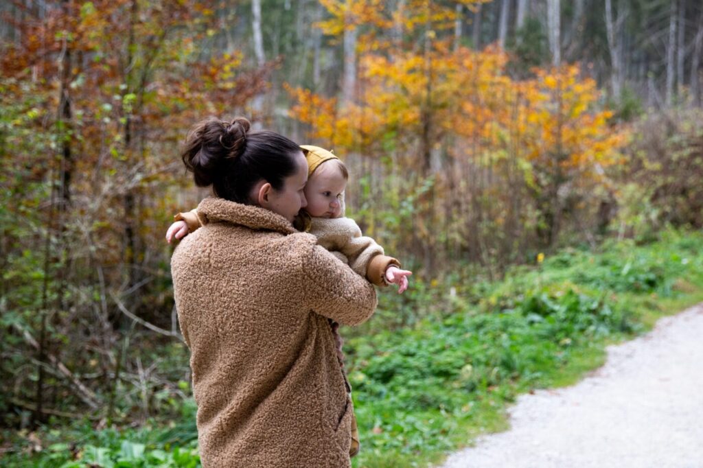 Women holding toddler