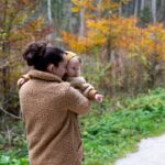 Women holding toddler