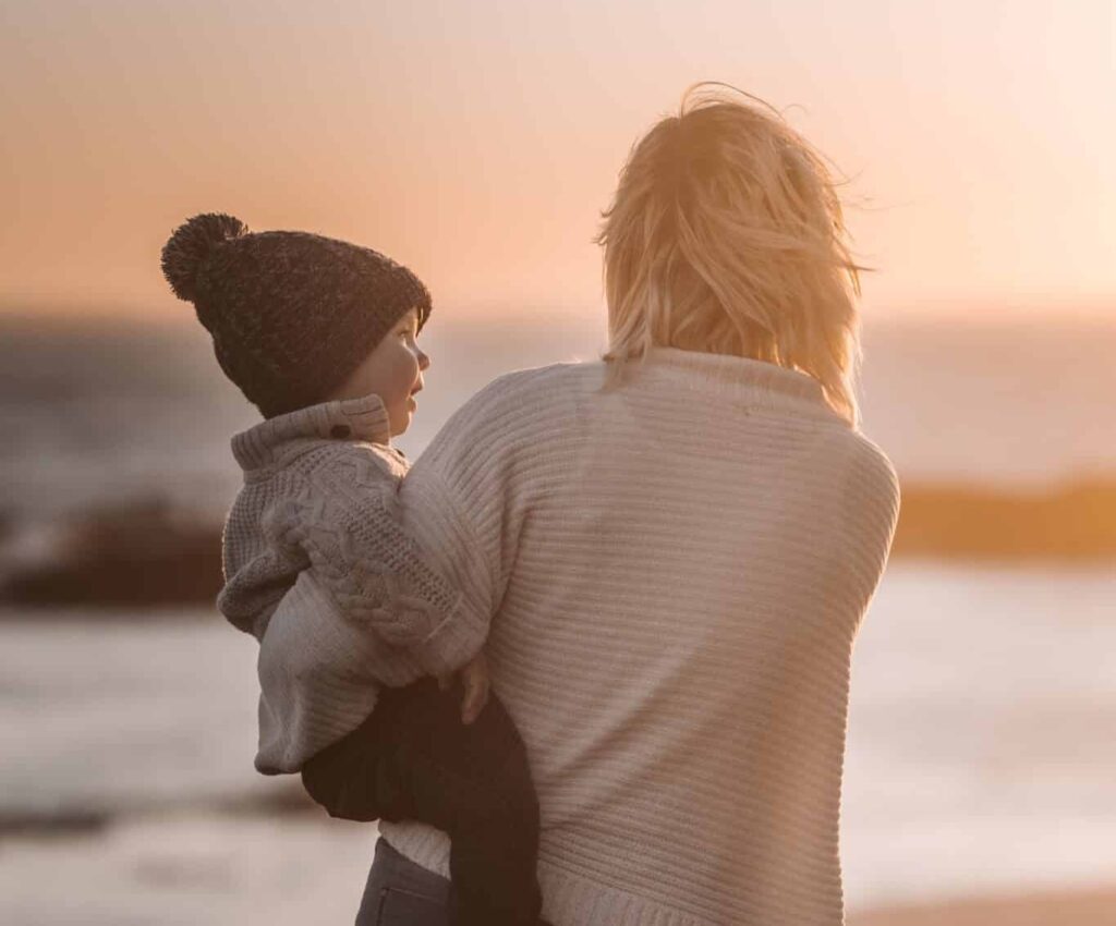 Mum and child on beach