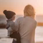 Mum and child on beach